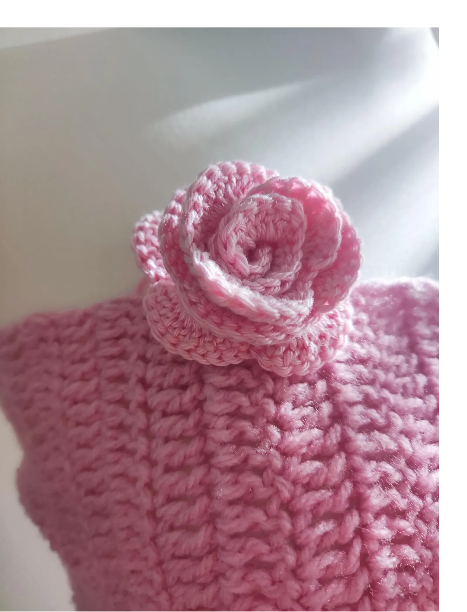 Pink crochet piece close-up