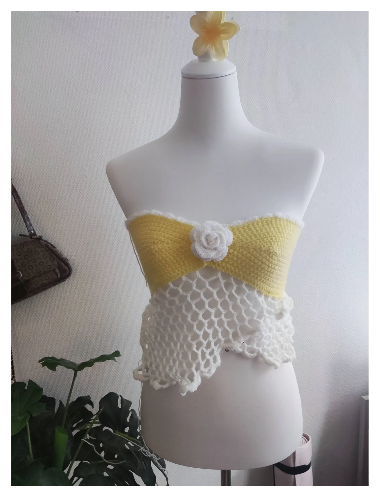 Handmade crochet top on mannequin