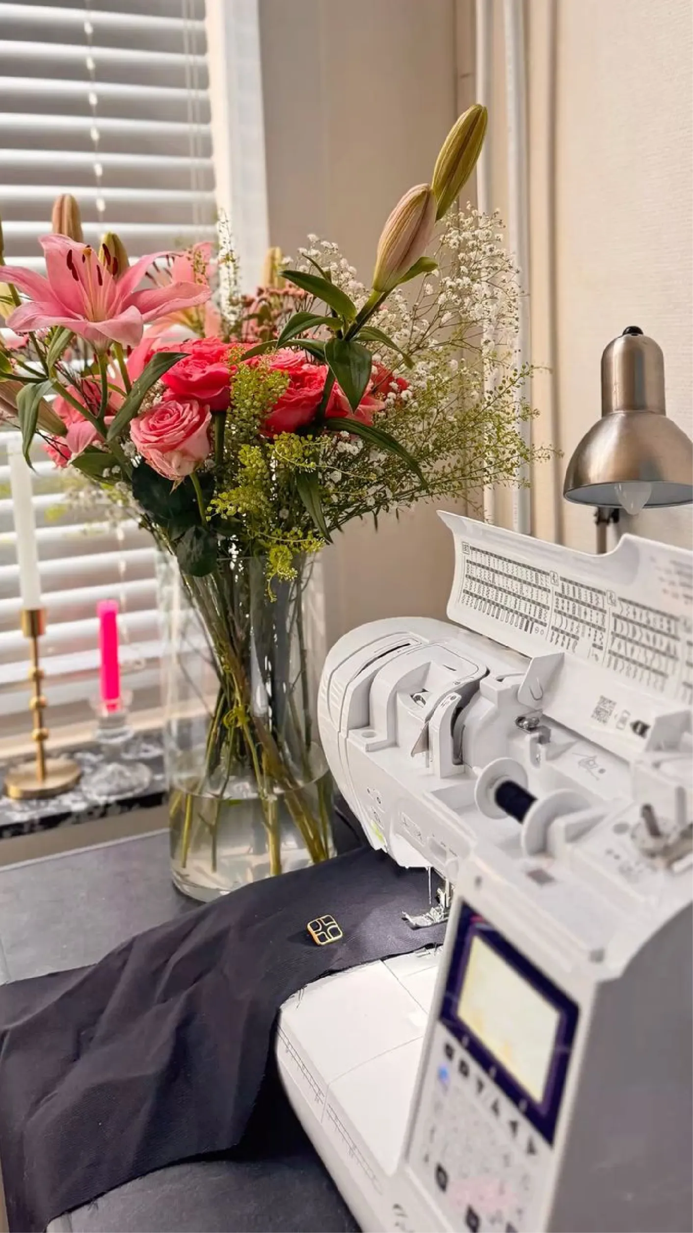 Sewing machine workspace with flowers